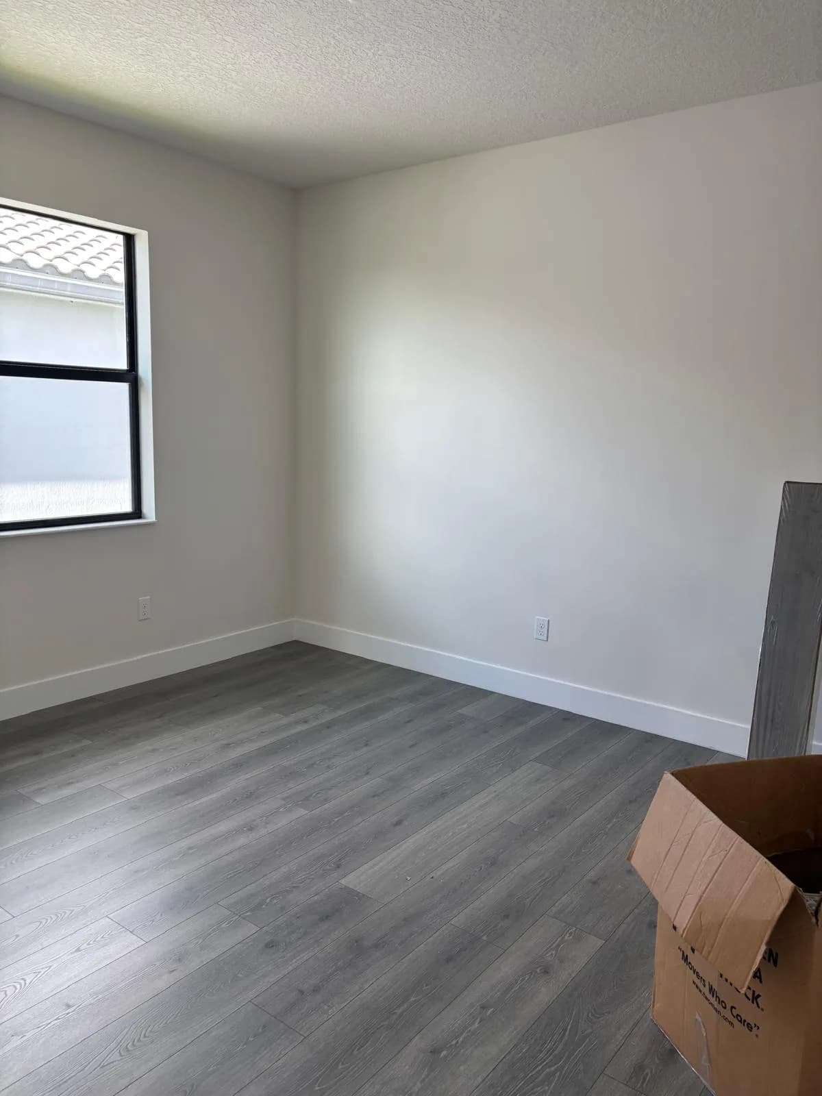 Interior Painting Grey Bedroom by JC General Painting in South Florida