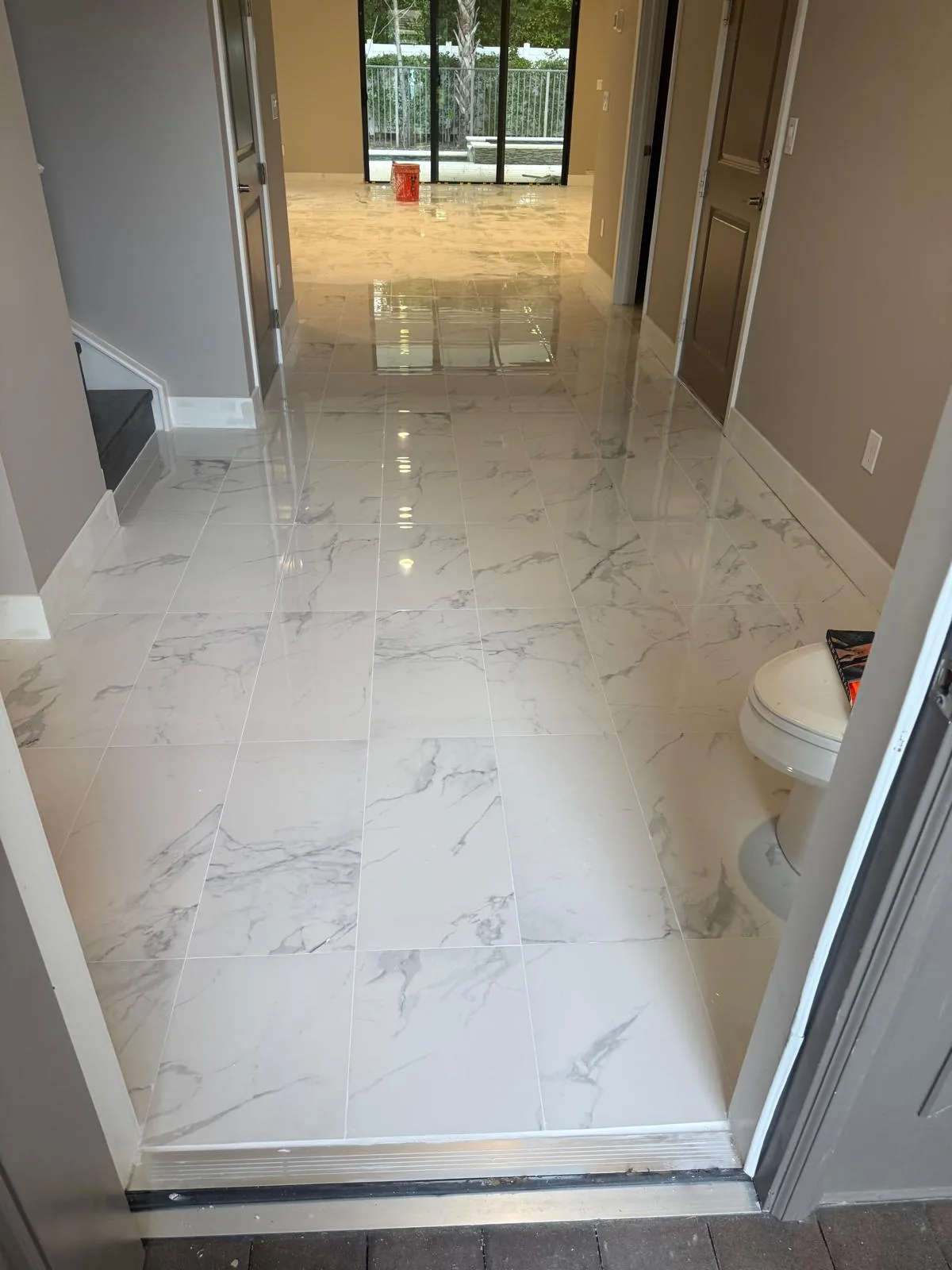 Marble Flooring Installation Entry Foyer by JC General Painting in South Florida