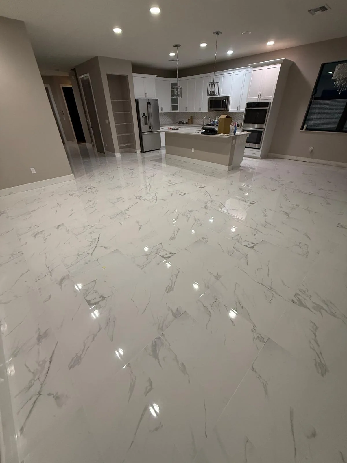Marble Tile Flooring Open Kitchen by JC General Painting in South Florida