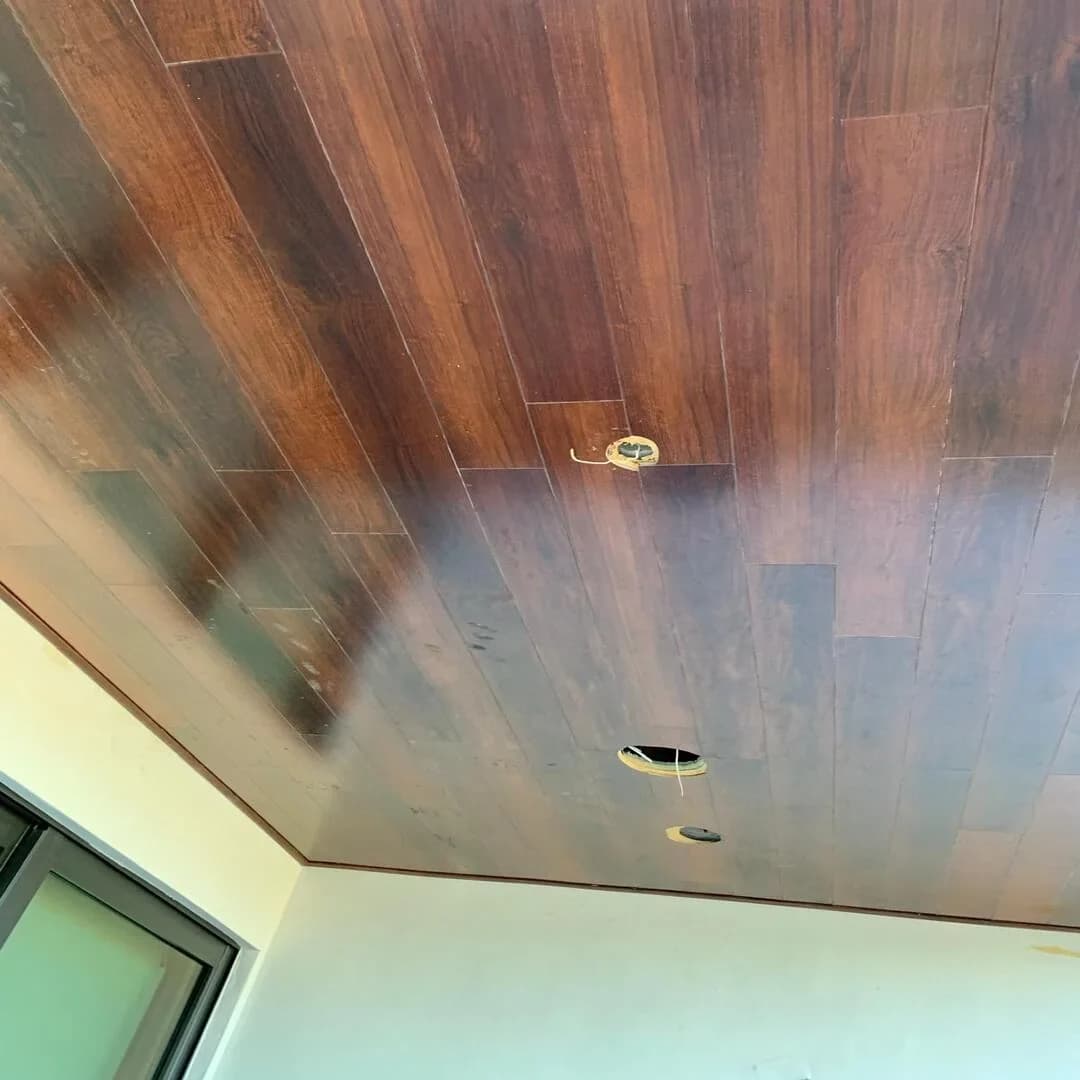 Custom wood plank ceiling detail by JC General Painting in South Florida